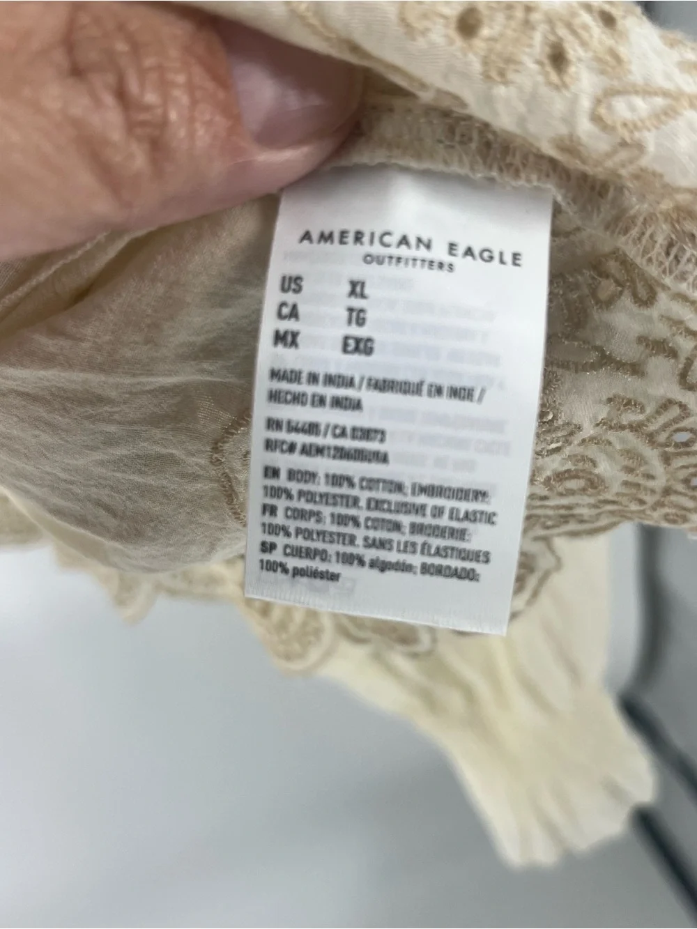 American Eagle Outfitters Cream Smocked Peasant Blouse with Embroidered Ruffle